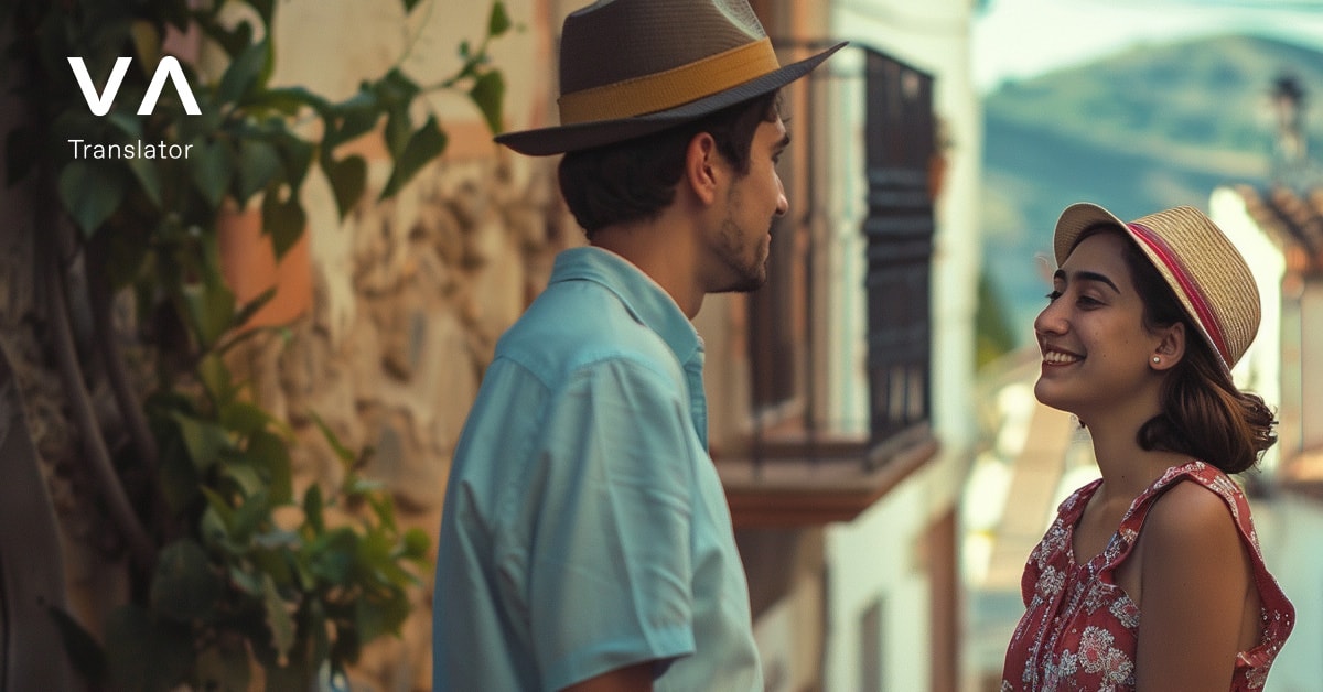 Dos personas conversando en un pintoresco pueblo, mostrando formas de decir hola en diferentes idiomas.