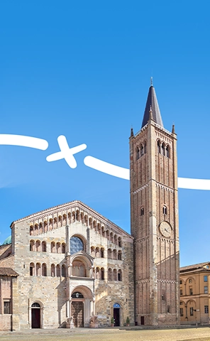 Un edificio histórico en Parma, Italia, con detalles arquitectónicos tradicionales que reflejan el rico patrimonio cultural de la ciudad.